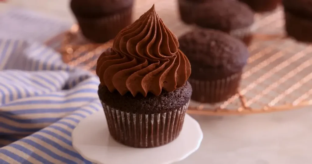 Delicious moist chocolate cupcakes with creamy frosting - a sweet delight for any occasion!